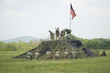 Photo: A World War II reenactment of US Marines raising the American flag on Iwo Jima on February 23, 1945 at Mid-Atlantic Air Museum World War II Weekend and Reenactment in Reading, PA held June 18, 2008 A World War II reenactment of US Marines raising the American flag on Iwo Jima on February 23, 1945 at Mid-Atlantic Air Museum World War II Weekend and Reenactment in Reading, PA held June 18, 2008