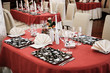 Tables set for dinner in modern restaurant