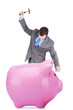 Young businessman and piggy bank
