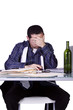 Foto: Stressed Businessman at His Desk Working Stressed Businessman at His Desk Working