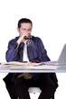 Foto: Businessman at His Desk Working Businessman at His Desk Working