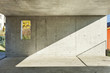 concrete wall of a garage, small window to the garden