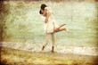 Couple kissing at the beach.