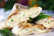 Roasted pancake with sheep cheese and greens