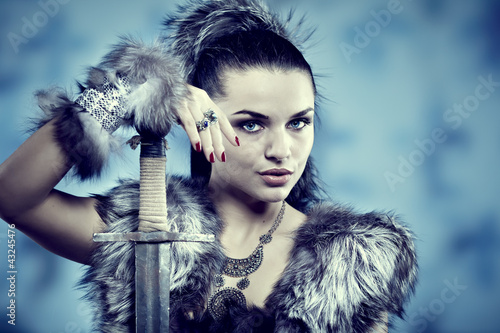 Photo: Warrior woman. Fantasy fashion idea. Warrior woman. Fantasy fashion idea.