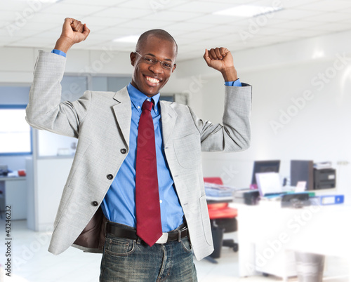 Photo: Portrait of an happy businessman Portrait of an happy businessman