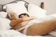 Young lovers in bed