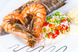 Photo: Giant prawns with sea bass fish. Giant prawns with sea bass fish.