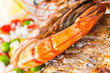 Photo: Giant prawns with sea bass fish. Giant prawns with sea bass fish.