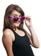 Photo: Portrait of a pretty girl teenager with sunglasses in studio Portrait of a pretty girl teenager with sunglasses in studio