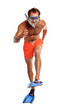 Photo: Caucasian swimmer wearing mask, snorkel and flippers walking Caucasian swimmer wearing mask, snorkel and flippers walking