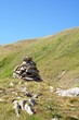 Hiking cairn marking a trail in mountain