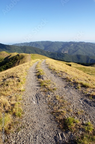 Photo: Dirt road in the Appennine mountains, Tuscany, Italy. Dirt road in the Appennine mountains, Tuscany, Italy.