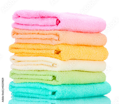 Photo: colorful towels isolated on white colorful towels isolated on white