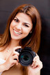 Woman with a digital camera