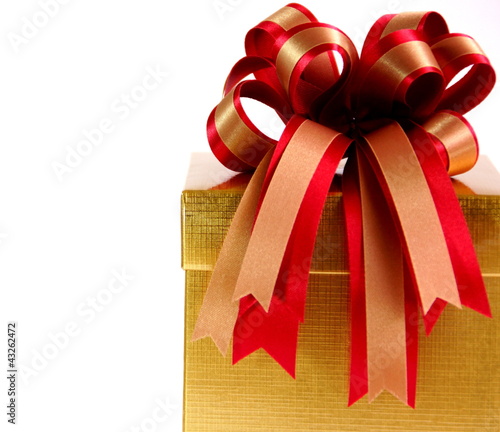 Photo: Gift Box with Colorful Ribbons on White Background Gift Box with Colorful Ribbons on White Background