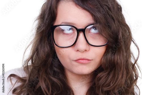 Photo: beleidigte junge frau mit brille beleidigte junge frau mit brille