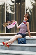 Happy shopper on the steps