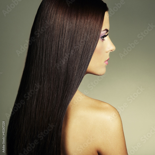 Photo: Fashion photo of a young woman with dark hair Fashion photo of a young woman with dark hair