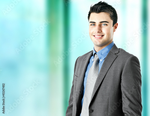 Photo: Handsome smiling businessman Handsome smiling businessman