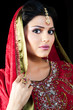 Indian bride wearing a red bridal dress