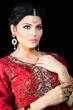 Indian bride wearing a red bridal dress