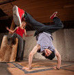 Photo: Break Dancer Does Upside Down Kick Break Dancer Does Upside Down Kick