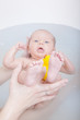 baby girl having a bath