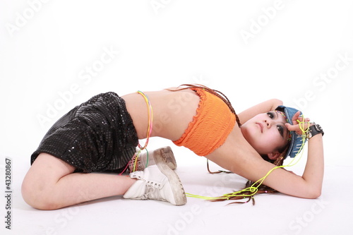 Photo: Cute girl in various dance costumes and fun poses. Cute girl in various dance costumes and fun poses.