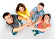 group of young people holding hands