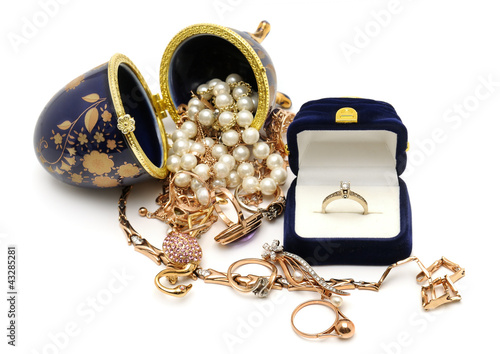 Photo: Gold ornaments isolated on white background Gold ornaments isolated on white background