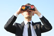 Business man with binoculars