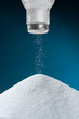 Pouring salt from a salt pot
