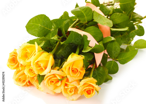 Photo: beautiful bouquet of roses isolated on white beautiful bouquet of roses isolated on white