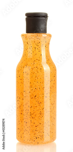 Photo: Bottle with scrub isolated on white Bottle with scrub isolated on white