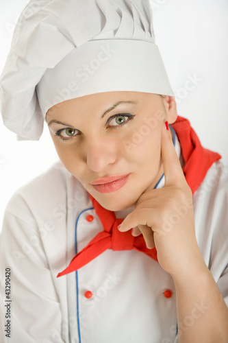Photo: Thoughtful female chef Thoughtful female chef