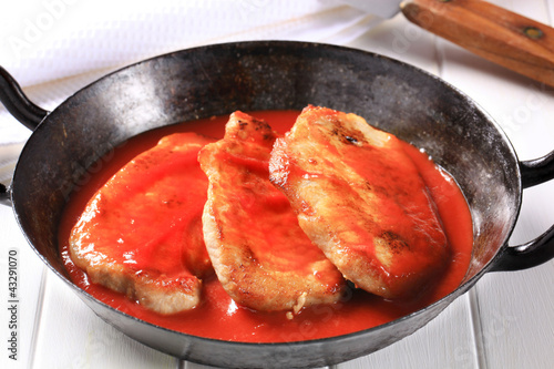 Photo: Pork chops with tomato sauce Pork chops with tomato sauce