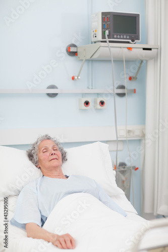 Photo: Elderly patient lying with closed eyes Elderly patient lying with closed eyes