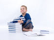 Photo: cute, little boy with books, on white cute, little boy with books, on white