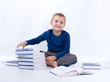 Photo: cute, little boy with books, on white cute, little boy with books, on white