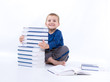 Photo: cute, little boy with books, on white cute, little boy with books, on white
