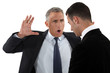 Boss shouting at employee