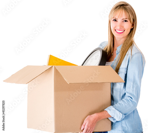 Foto : Woman moving house Woman moving house