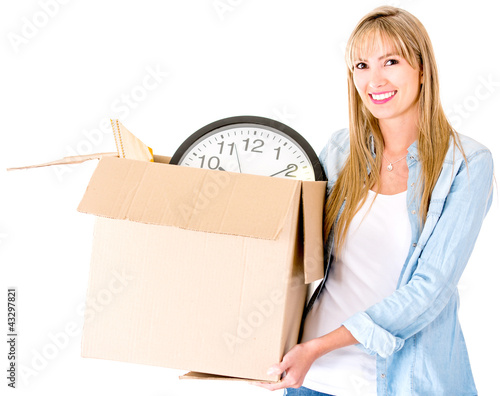 Photo: Woman carrying a box Woman carrying a box