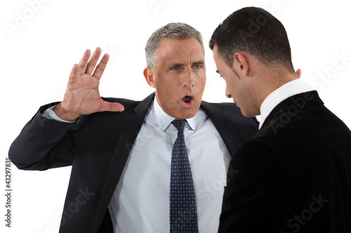 Foto: Boss shouting at employee Boss shouting at employee