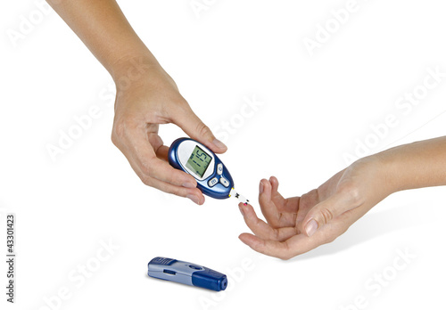 Photo: Measuring glucose level Measuring glucose level
