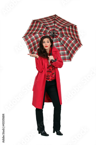 Photo: elegant woman under her umbrella elegant woman under her umbrella