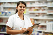 Pharmacy chemist woman in drugstore