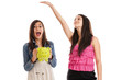 Photo: Teen girls emptying piggybank Teen girls emptying piggybank