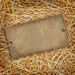 Straw texture background with cardboard label